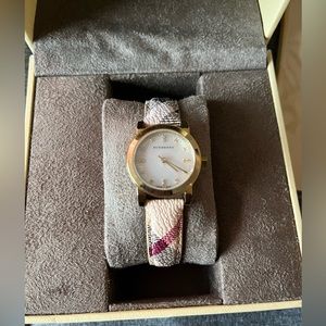 Authentic Burberry watch with original packaging.